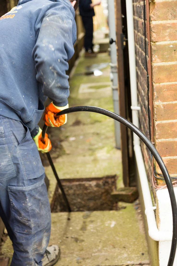Technician performing Hydro Jetting Service